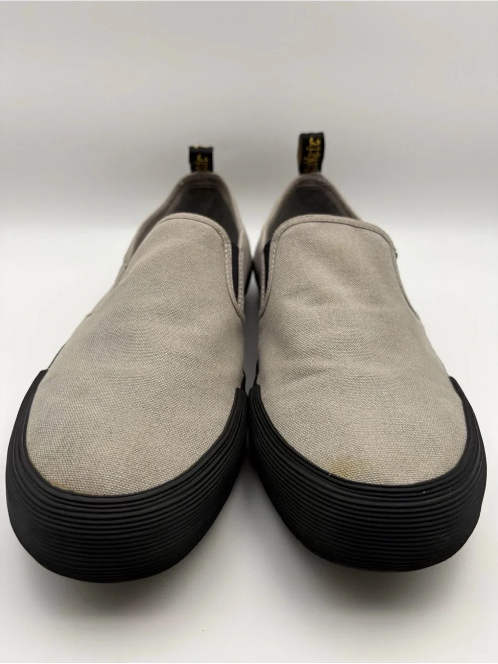 Dr. Martens Beige Canvas Slip-On Loafers with Black Sole and Gold Stripe